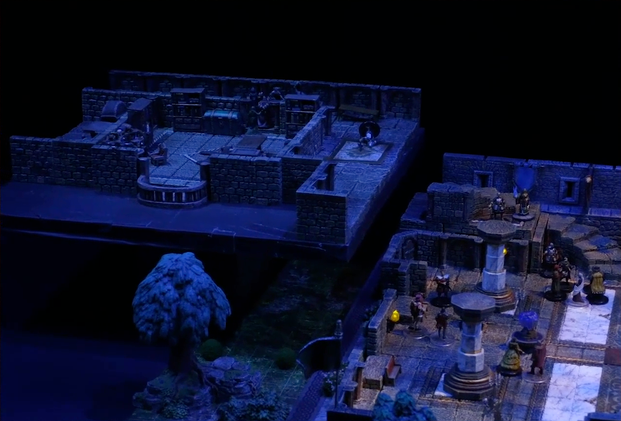 A battlemap of a stone palace split into two levels. Downstairs is a marble floor, marble pillars, and a staircase curving up. A number of people are scattered throughout the downstairs space. Upstairs is a hallway leading past a room with a bearskin rug, wooden table, and balcony. A number of robed individuals including Ethrand Tachonis gather outside the room, down the hall from a fallen guard.