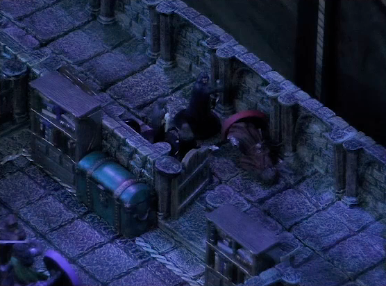 A battlemap of a stone hallway outside an open door. Thaisha faces off against three robed individuals. Occtis lays on a wooden table in a nearby room, surrounded by other robed individuals.